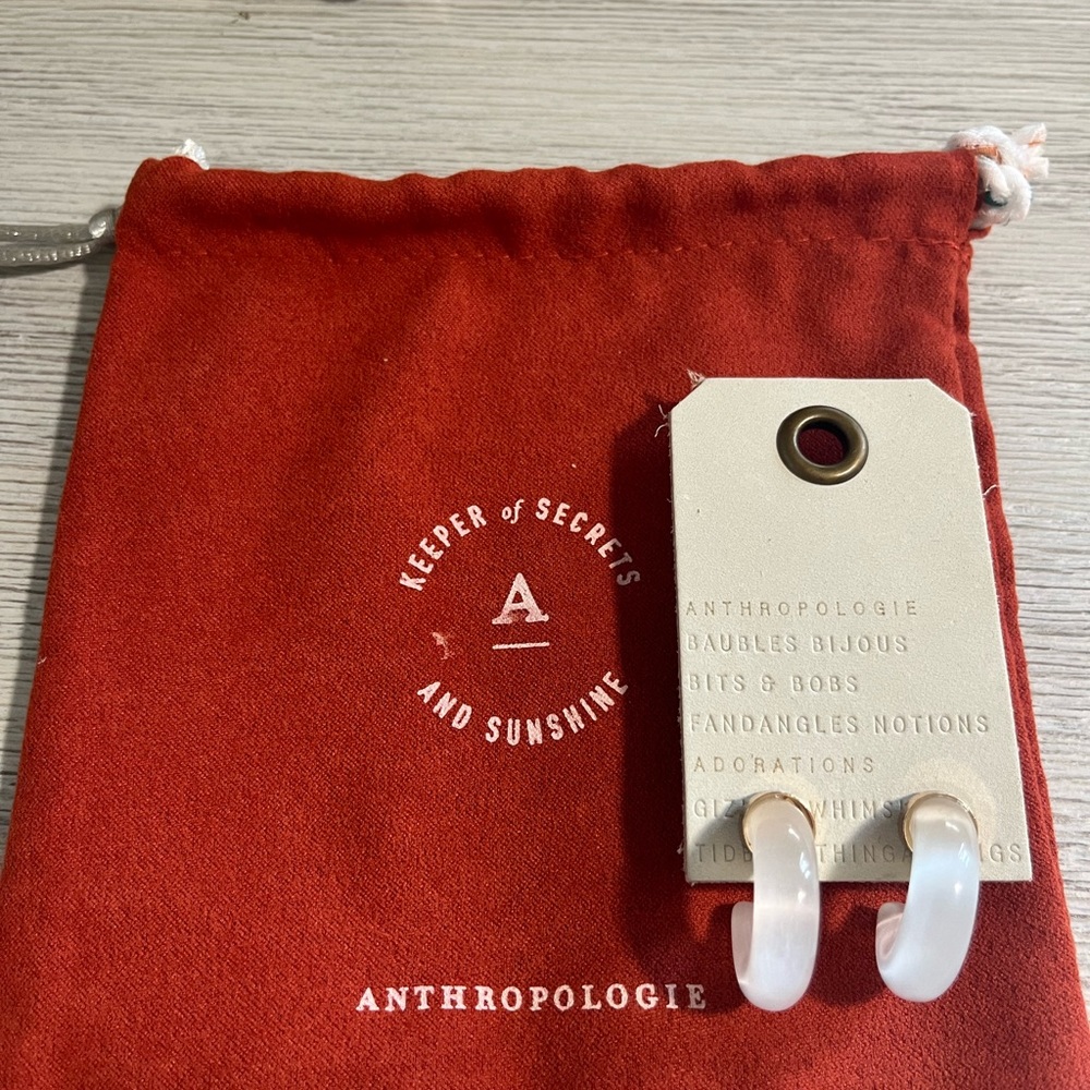 Anthropologie acetate, white hoop, earrings with gold ball backs